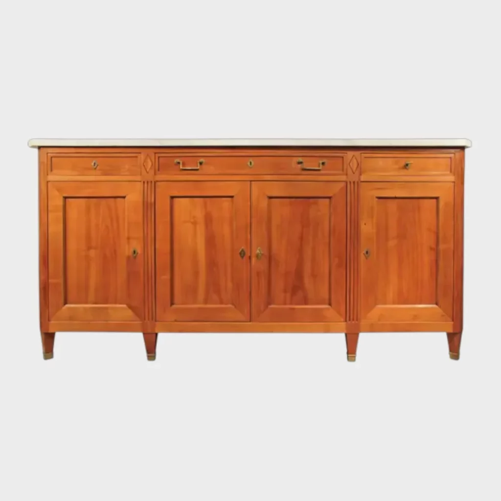 Meuble enfilade d'époque montrant la sobriété du style Directoire et ses bronzes discrets